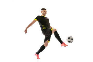 Fototapeta na wymiar Professional male football soccer player in motion and action isolated on white studio background. Concept of sport, goals, competition, hobby, world cup