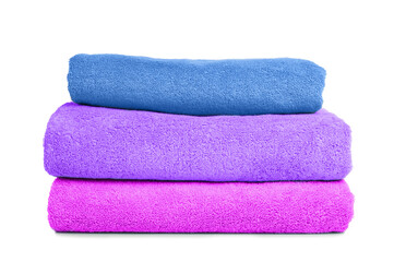 Folded soft terry towels on white background