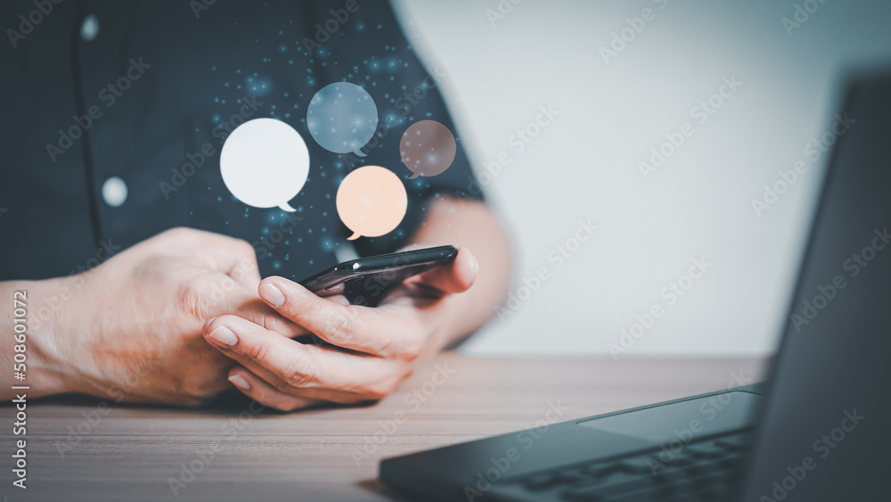 Poster Man hand using smartphone typing live chat chatting on application communication digital web and social network concept. Social media application chat box.