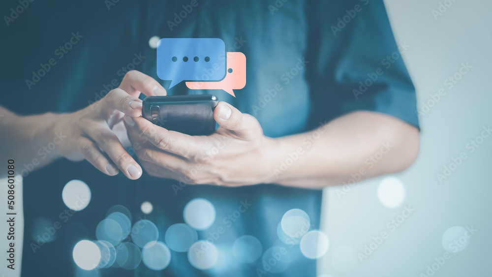 Poster Man hand using smartphone typing live chat chatting on application communication digital web and social network concept. Social media application chat box.