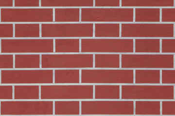 Texture - plastered red wall with painted bricks