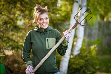 Picture of woman working with tools in the garden