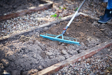 Picture of woman working with tools in the garden