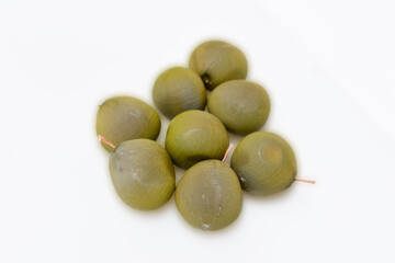 Nucker nut, Grey nickers, Bonduc nut, Gray nicker (Caesalpinia. Bonduc (L.) Roxb.) Seeds, medicinal properties and it is believed that a magic charm. Bonduc nut seed isolated on white background.