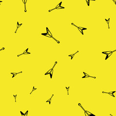 Black Electric Guitars on Yellow Background