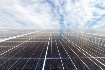 Solar park in the dutch countryside. Solar park with blue sky and clouds.