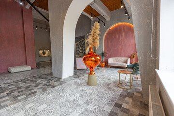 interior of a large apartment in oriental mixed with loft style with arches, led lighting and...