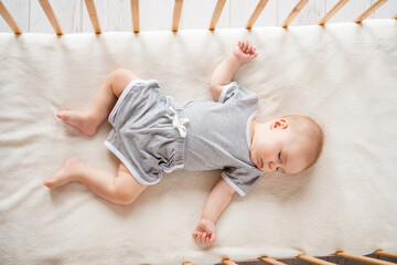 Above view full size photo of adorable cute toddler closed eyes laying bed sleep drowse house...