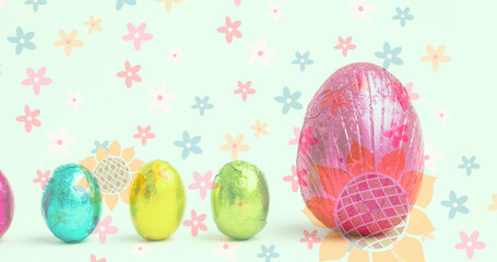 Composite image of flowers icons moving over colorful easter eggs against white background