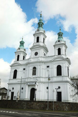 Obraz premium RADOMSKO, POLAND - APRIL 04, 2022: Exterior of beautiful Saint Lambertus church on sunny day