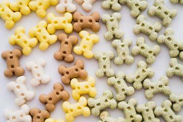 top view of bone shaped biscuits for pet isolated on white.