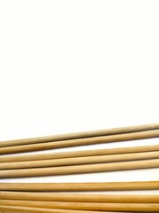 chopsticks on bamboo mat