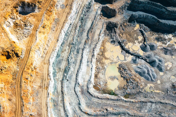 Dolomite Mine. Industrial Terraces. Aerial view of open pit mining. Excavation of the Dolomite Mine. Extractive industry. - obrazy, fototapety, plakaty