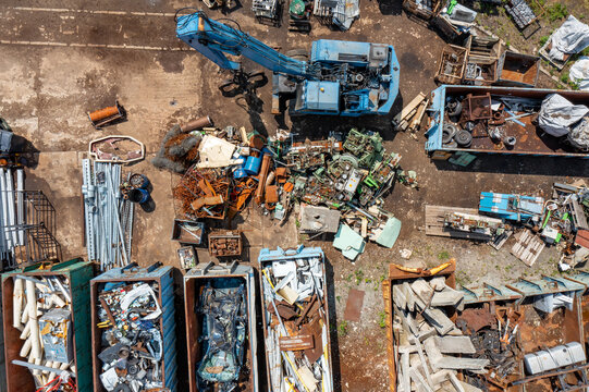 Aerial view of Scrap Storage. Industrial Background. Straw Recycling. - Powered by Adobe