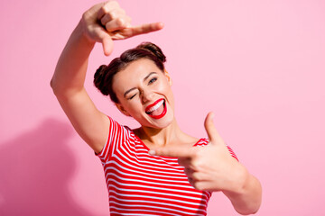 Photo of funky positive lady arms fingers show cadre gesture isolated on pink color background