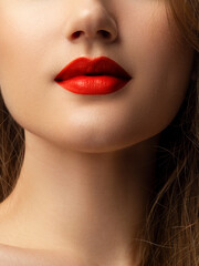Fototapeta premium Sexual full lips. Natural gloss of lips and woman's skin. The mouth is closed. Increase in lips, cosmetology. Natural lips. Great summer mood with open eyes. fashion jewelry. Pink lip gloss
