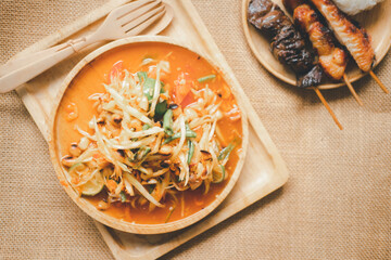 Green papaya salad Thai cuisine spicy delicious called SOM-TAM.