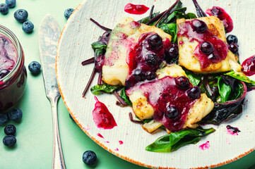 Baked fish,pangasius on white plate