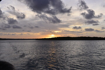 sunset over the river, horizon line, natural landscapes, river meets sea, sunset background