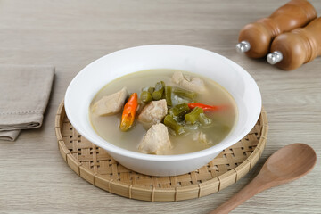 Asem-Asem Ayam or Garang Asem Ayam, Indonesian traditional food, processed chicken dishes with sour and spicy flavors. 
