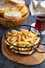 Fried potatoes. Homemade fried potatoes on a dark background. close-up