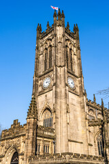 Fototapeta na wymiar Manchester, Lancashire, England, UK - Tower of the cathedral of Manchester; the Cathedral and Collegiate Church of St Mary, St Denys and St George