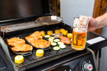 Beer and grill barbecue outdoors on the backyard. Bbq party.
