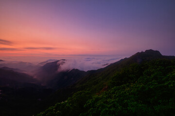 Scenic view of mountains against sky during sunrise