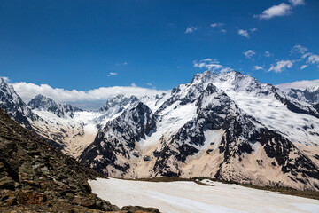 Fototapeta na wymiar Snowy peaks in Caucasus mountains
