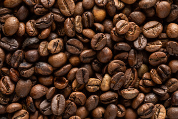 Background of roasted coffee beans with pleasant aroma