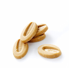 White chocolate granules, on a white background