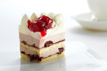 Fresh delicious cherry cake on white background