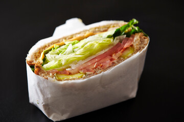 sandwich with ham and vegetables