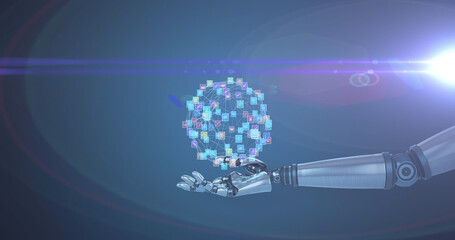 Image of network of media icons over hand of robot arm, with pulsing light on dark background