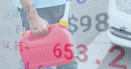 Image of financial data processing over man carrying canister with fuel