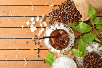 Natural iced coffee on wooden table top view