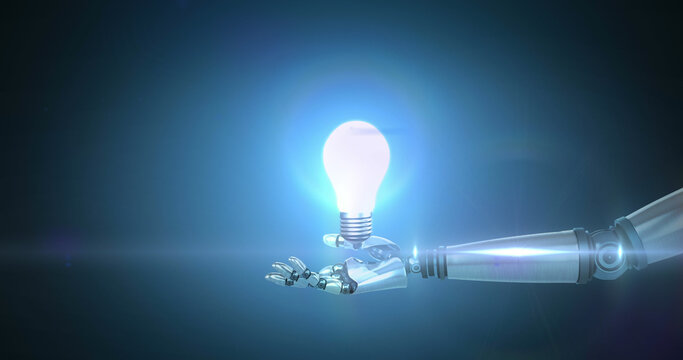 Image of illuminated light bulb over hand of robot arm, with moving light on blue background