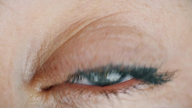 Eye wide open. Astonished facial expression of a woman. Surprised look of person.