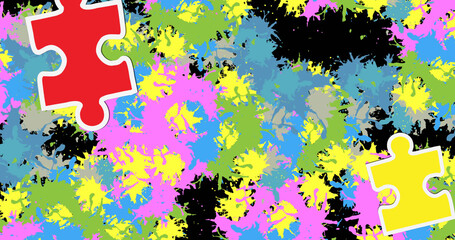 Image of puzzle falling over colourful stains