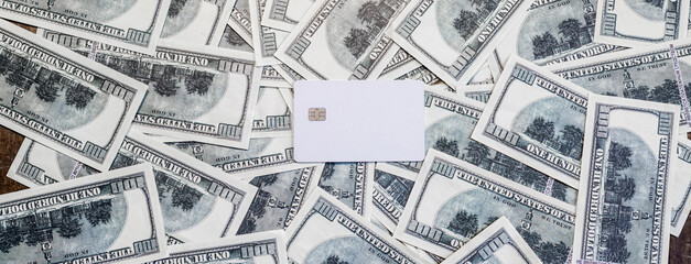 Bank card on banknotes. Departure of Ukrainian citizens to Europe