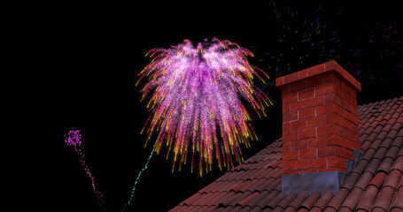 Image of roof and chimney with colourful christmas and new year fireworks exploding in night sky