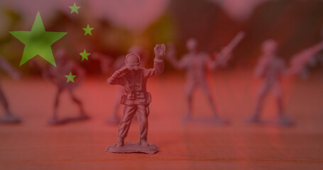 Image of flag of china over toy soldiers
