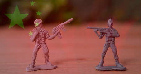 Image of flag of china over toy soldiers