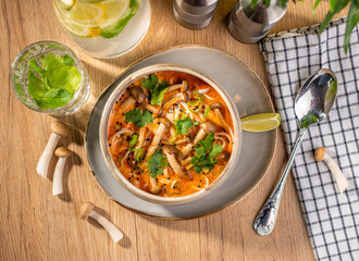 Delicious mushroom cream soup with fresh lemonade, top view