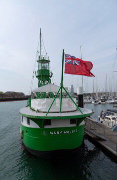 Gosport, Hampshire, England, UK. 2022.  The green and white painted Mary Mouse 2 a former British light ship now converted is a bar resaurant on the Gosport waterfront.