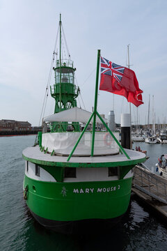 Gosport, Hampshire, England, UK. 2022.  The green and white painted Mary Mouse 2 a former British light ship now converted is a bar resaurant on the Gosport waterfront.