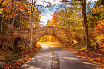 The Stanley Brook Bridge in the Acadia National PArk on a sunny fall day