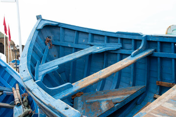 Fototapeta na wymiar Blue boats at Sqala du Port in Essaouira, Morocco 2018 