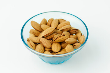 Mountain almond - snack, unpeeled nut. Close-up.