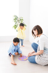 Children and teacher playing at kindergarten